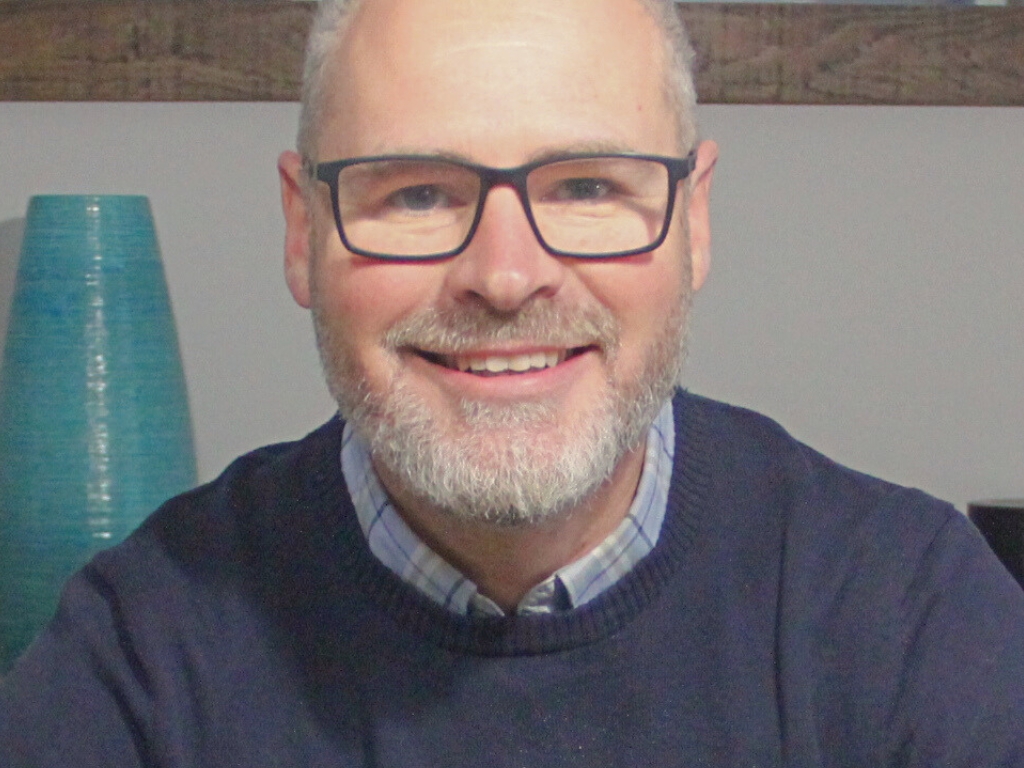 Image of Murray Pullin, the Work Management Specialist. Murray is smart casual with a professional stance.